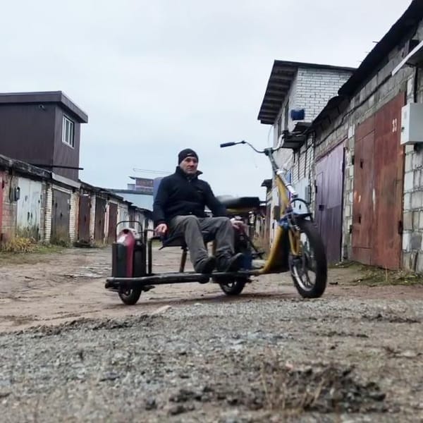 Электро мотоцикл с люлькой из моноколёс